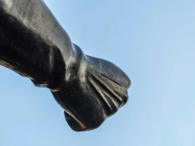 iron fist from statue